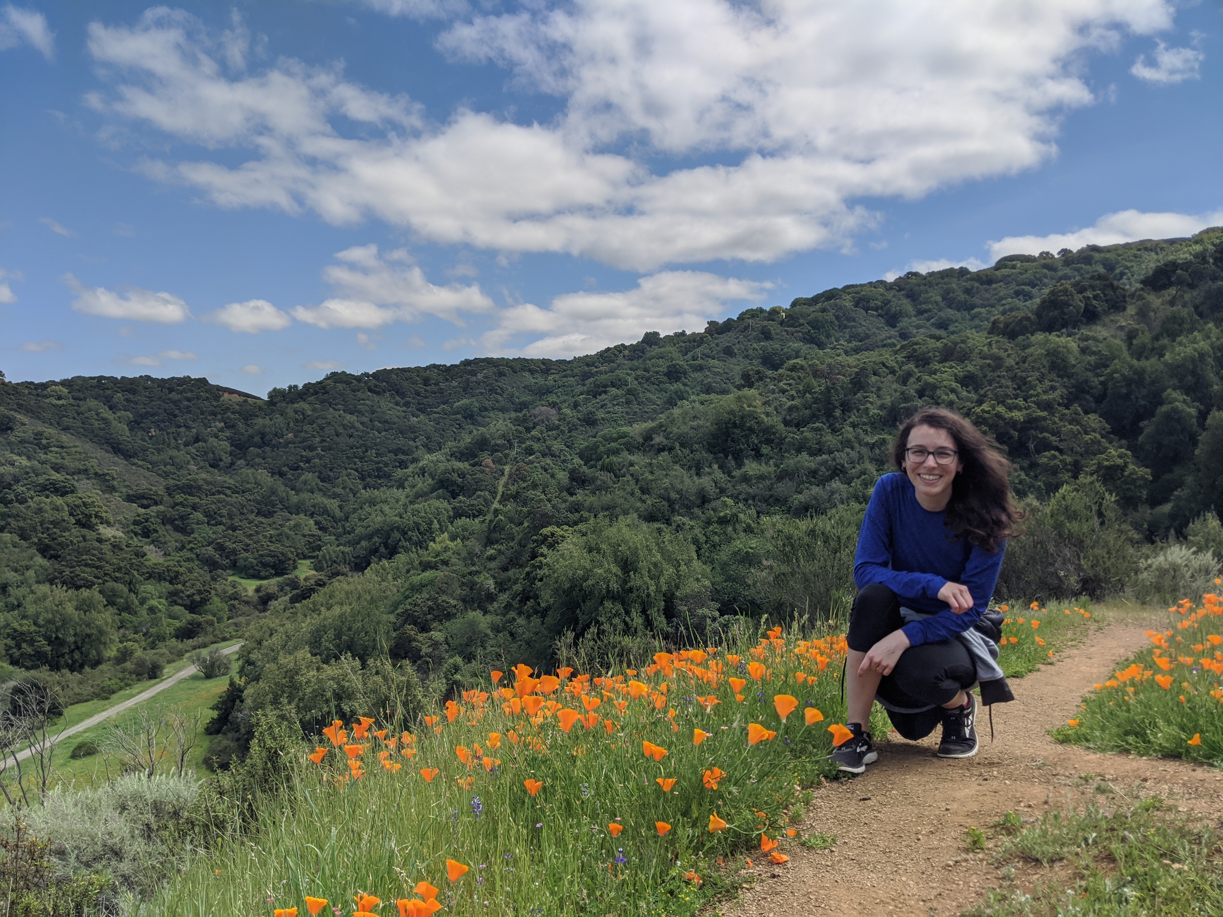 Julie with California poppies